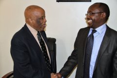 JMEC Chairperson H.E. Festus Mogae greets NCAC Chairperson Mr. Gichira Kibara